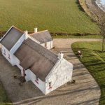 drone photo of cottage on mulroy bay