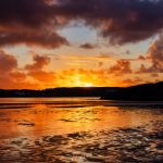 sunset over bad eddie boat