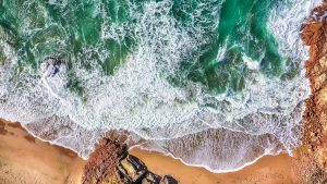 Birds eye view of ocean and beach