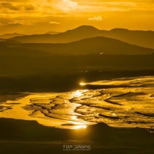 Sunset above the White Shore Beach and Ballyheirnan Bay