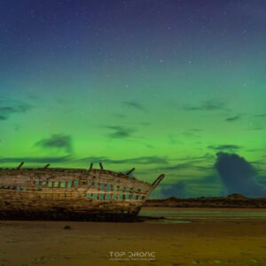 Northern lights illuminating Bad Eddie in Bunbeg