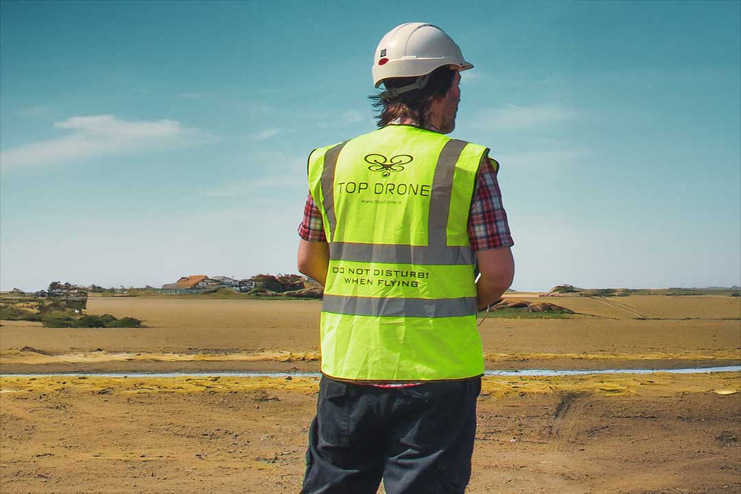 drone pilot with hi viz