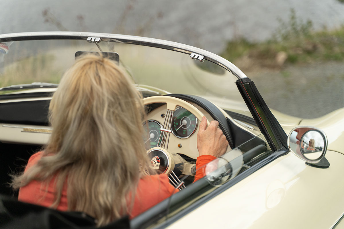 Cream Porsche Speedster 956 replica with driver