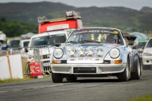 silver Porsche 911 starting at Portsalon